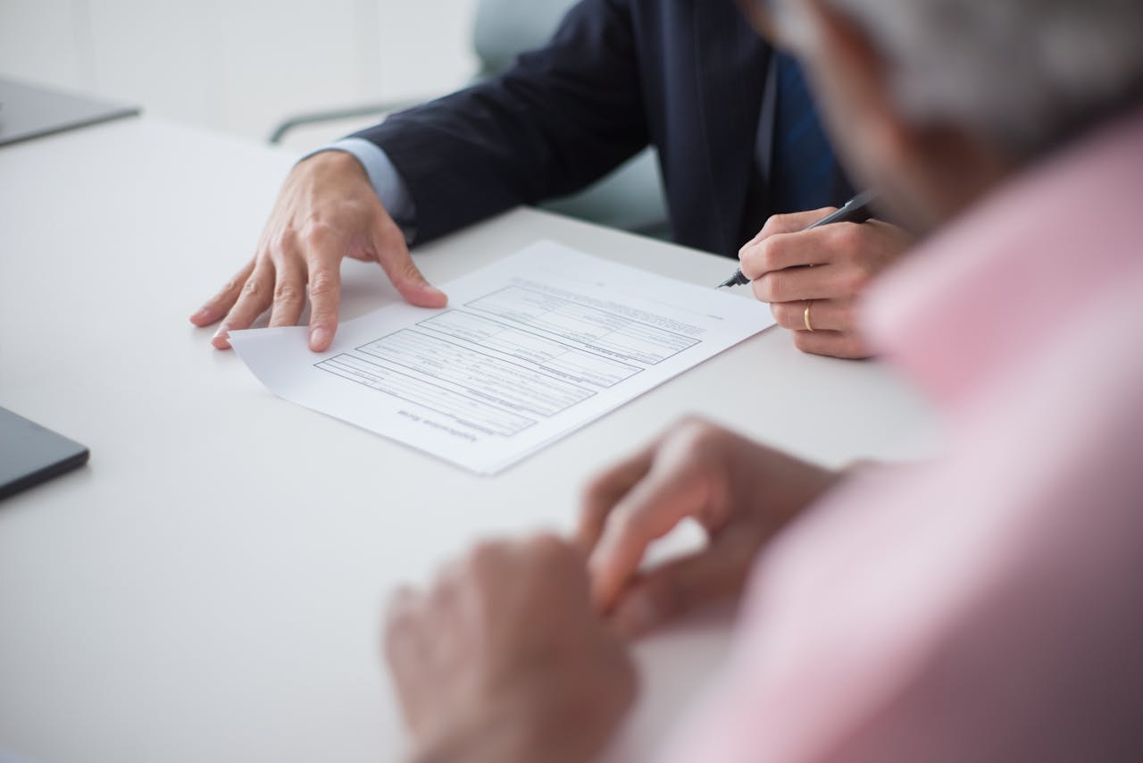 Elegant Man Signing Documents